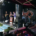 Band playing onstage under JezOs inflatable dome