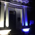 grand entrance lit up in white and blue