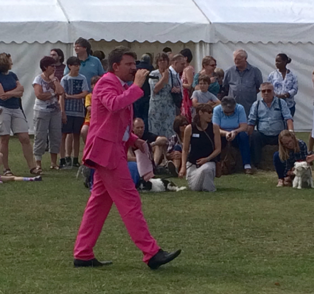 JezO in a pink suit. Village day Compere